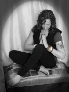 ZenJen spiritual jewelry designer and energist meditating - healing crystals