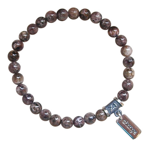 Charoite bracelet adorned with a sterling silver change charm by zen jewelz