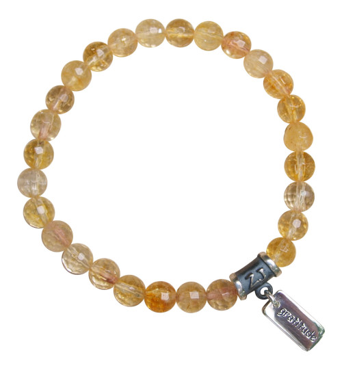 Citrine bracelet adorned with a sterling silver gratitude charm by zen jewelz