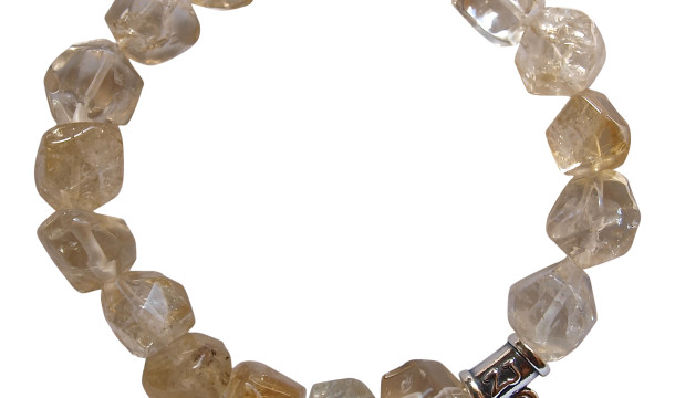 Citrine bracelet adorned with a sterling silver vitality charm by zen jewelz