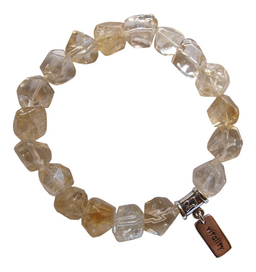 Citrine bracelet adorned with a sterling silver vitality charm by zen jewelz