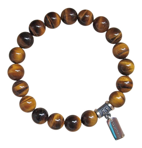 Tiger Eye bracelet adorned with a sterling silver abundance charm by zen jewelz