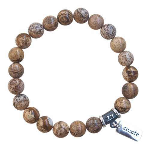 Jasper bracelet adorned with a sterling silver create charm by zen jewelz