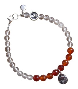 Carnelian and clear Quartz Chakra Stones bracelet adorned with a sterling silver sacral chakra charm - chakra stones