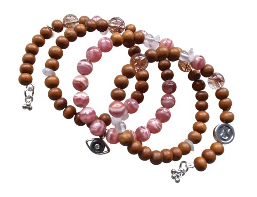 The ultimate love wrap made with crystals for love includes Rhodochrosite with sterling silver accents