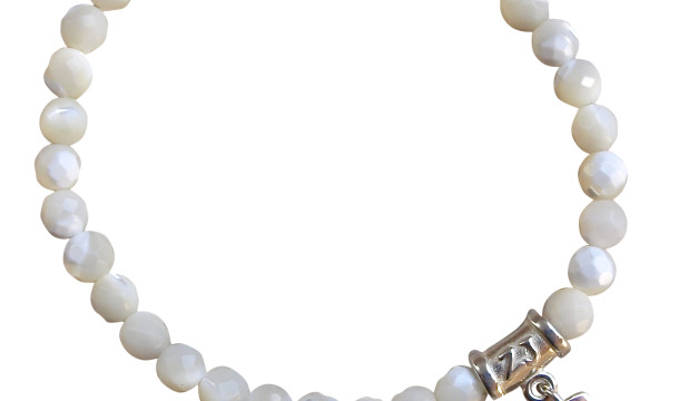 Mother of Pearl Bracelet adorned with a sterling silver protect charm