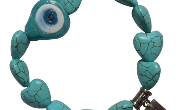 Evil eye bracelet made with a Turkish glass eye bead surrounded by heart shaped Turquoise gemstones